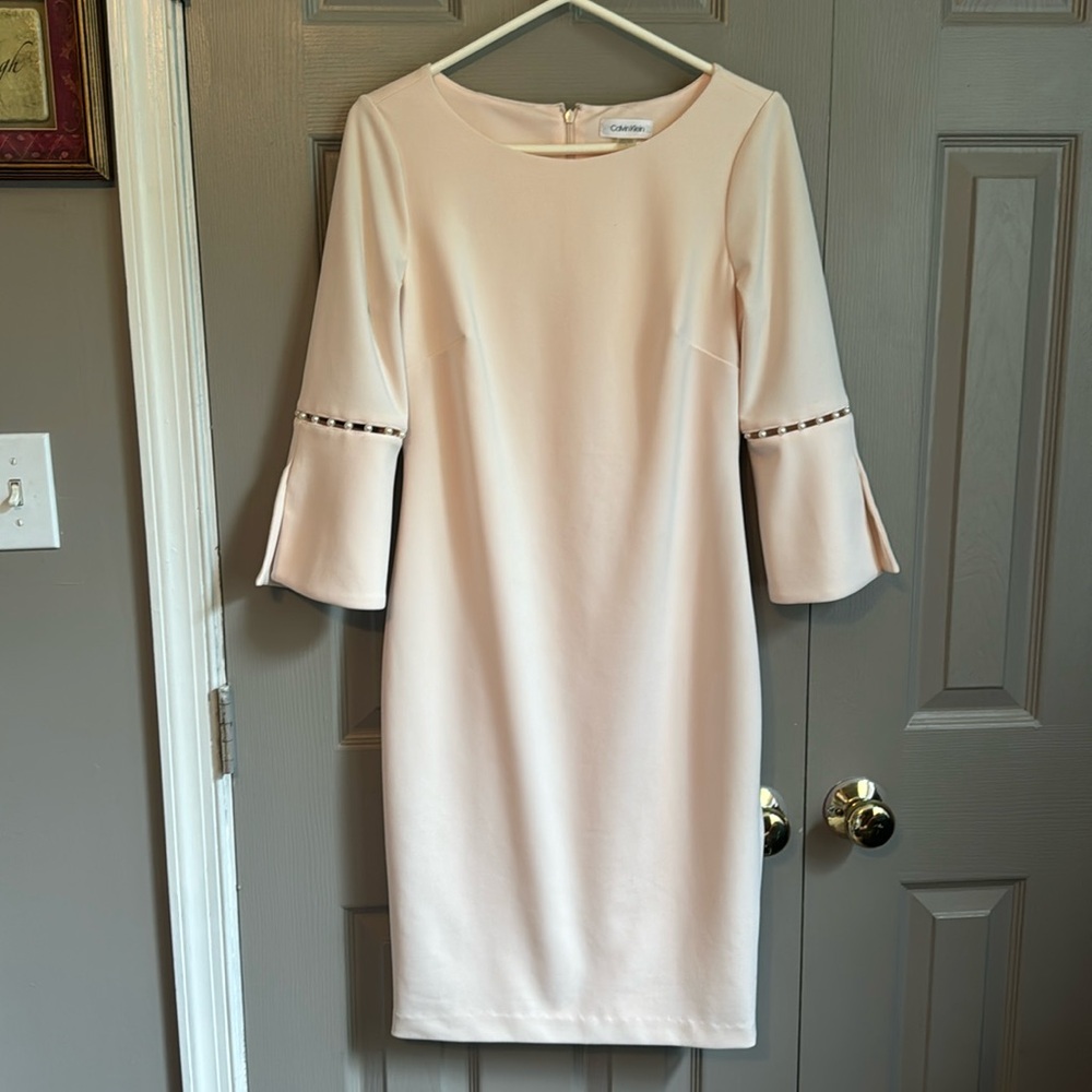 Calvin Klein -Pale Pink Dress with pearl sleeve accent.